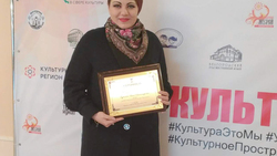 Инна Зубкова получила премию губернатора Евгения Савченко